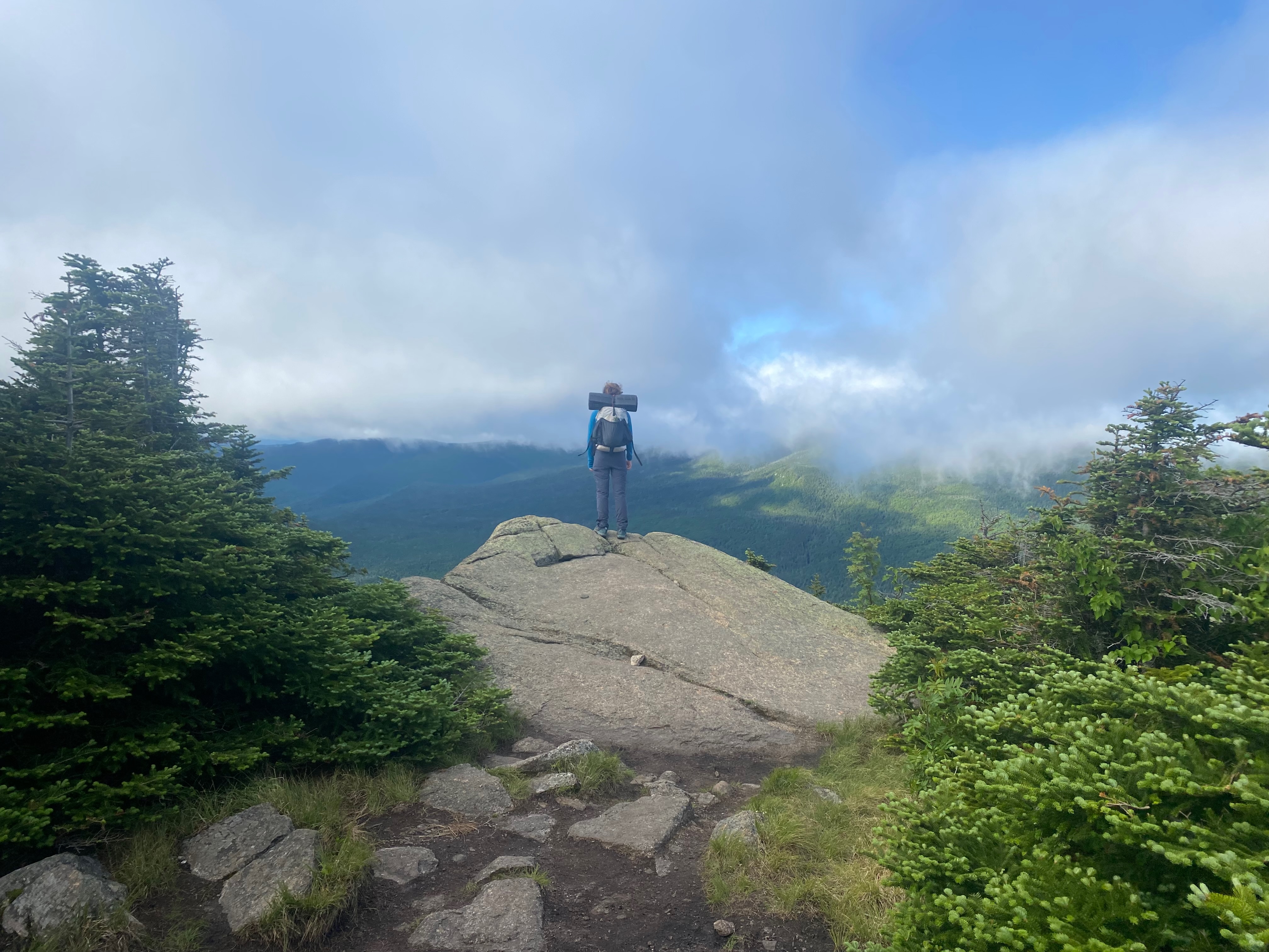 Standing at the edge of the clouds